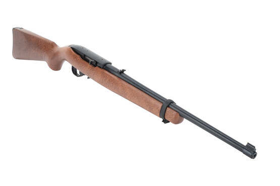 Ruger 10/22 22lr rifle with wood stock features a 16 in barrel